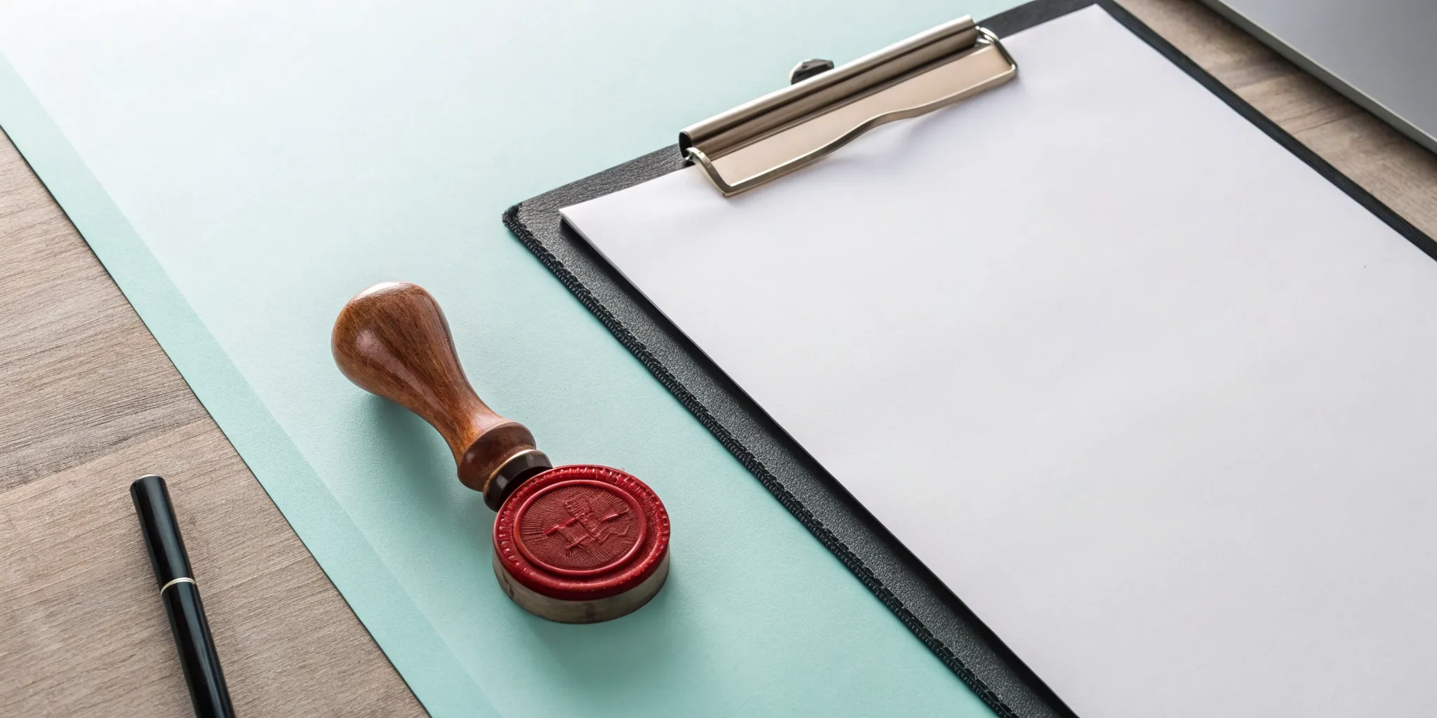 Official documents on a desk comparing a permit vs a license.